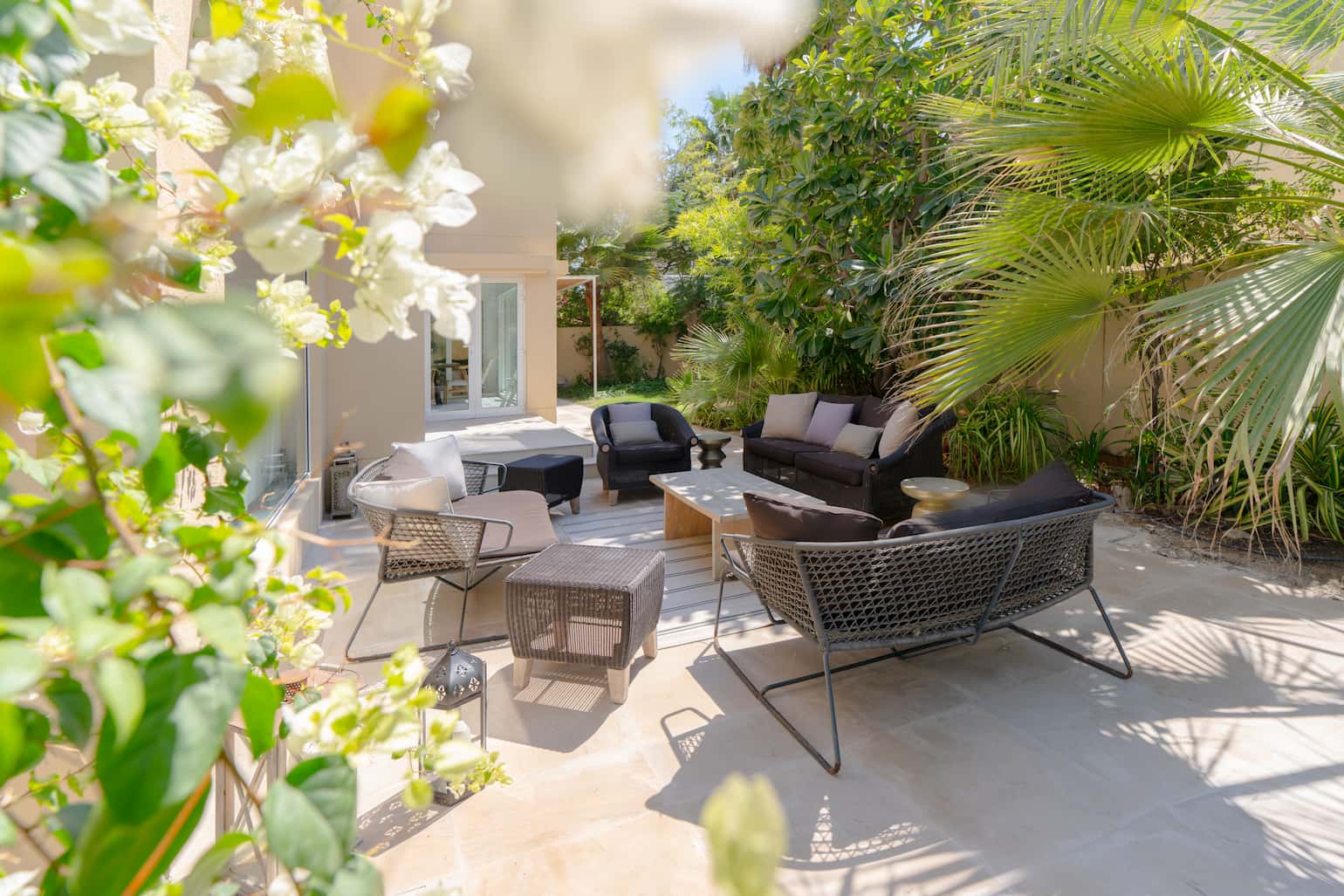 Meadows - Louis Vuitton Voyage Villa features effective space planning in an outdoor seating area designed for comfort and flow.