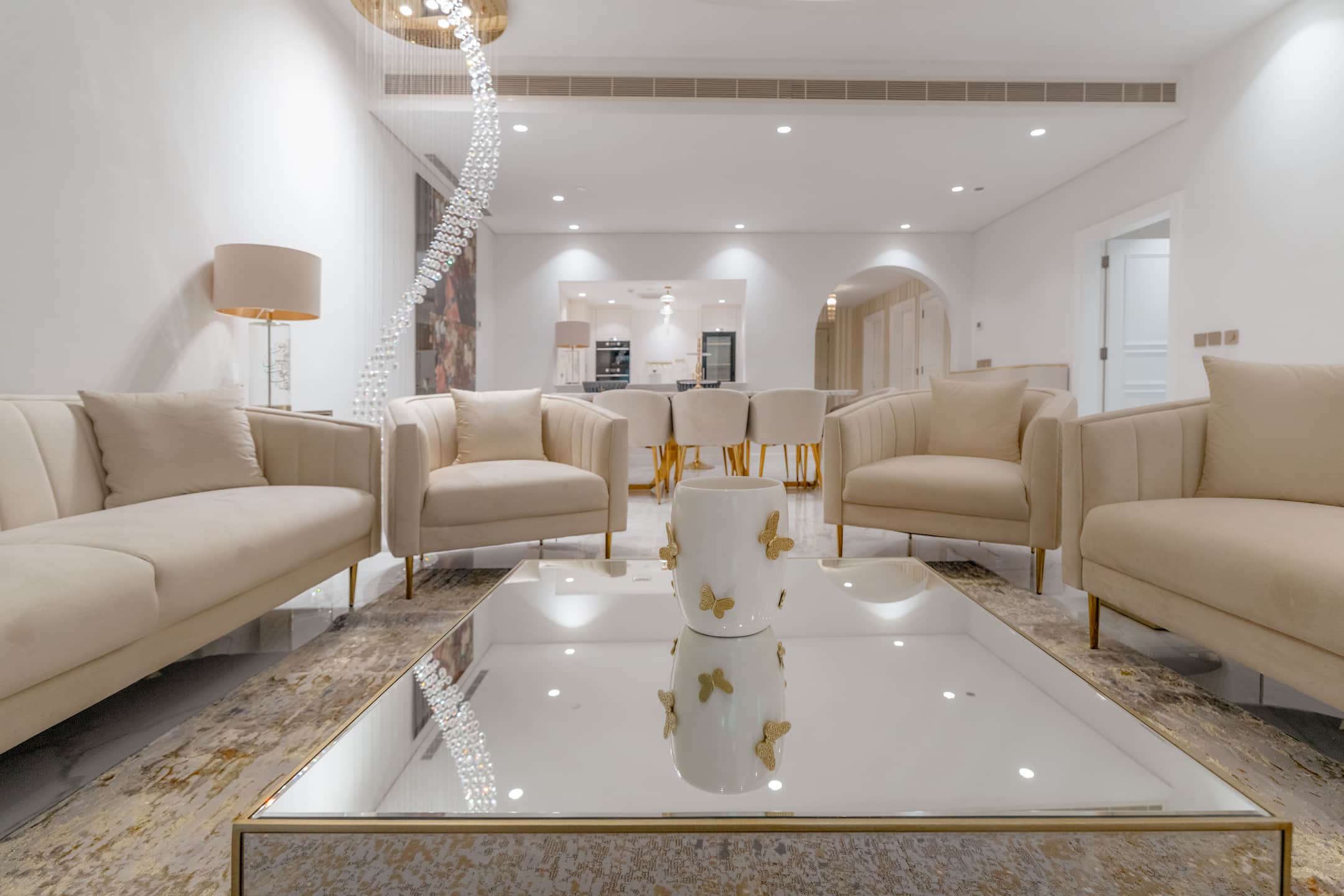 Golden Vienna villa fit-out works with a spacious living area and custom lighting details.